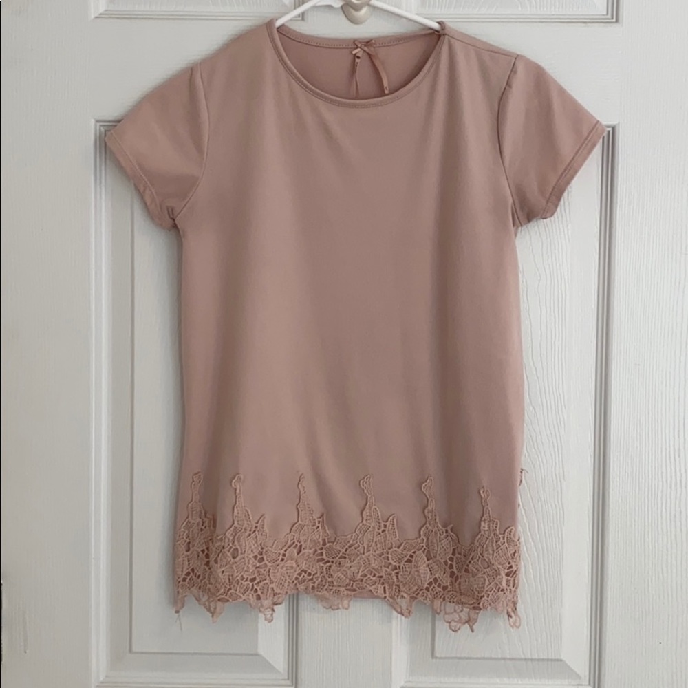 pink t shirt with some cute designs